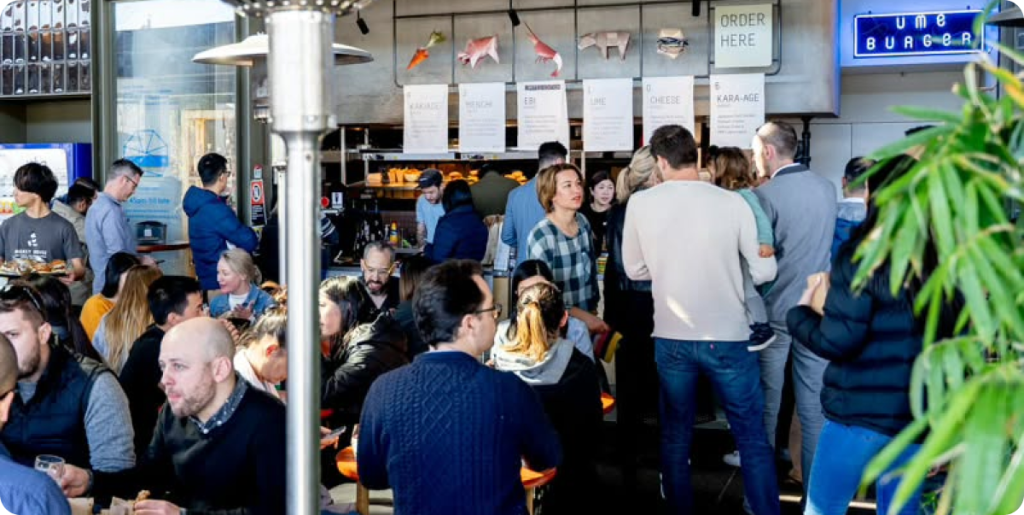 Crowded restaurant dining area to celebrate Vivid Sydney 2025 festival