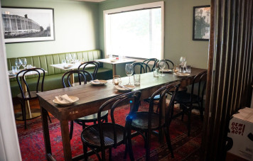 Tables and chairs set up at Woodend Cellar